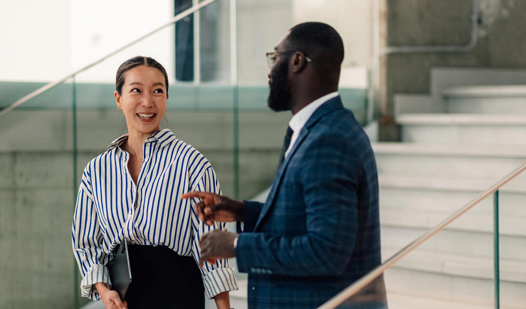 Two office workers having a conversation