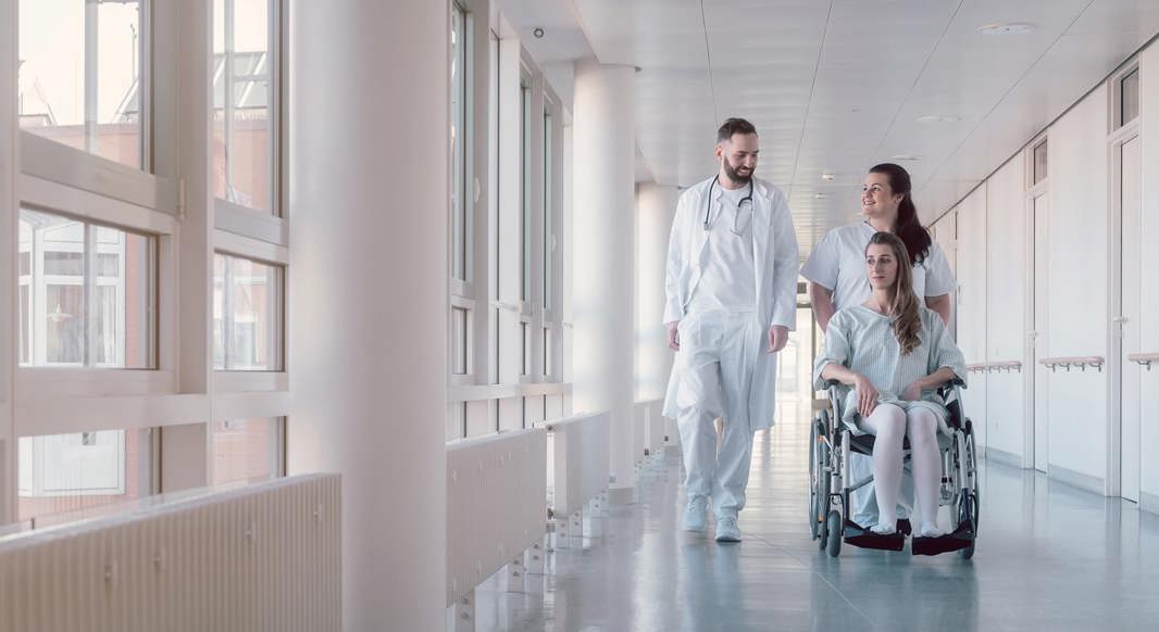 Medical staff and a patient in a hospital