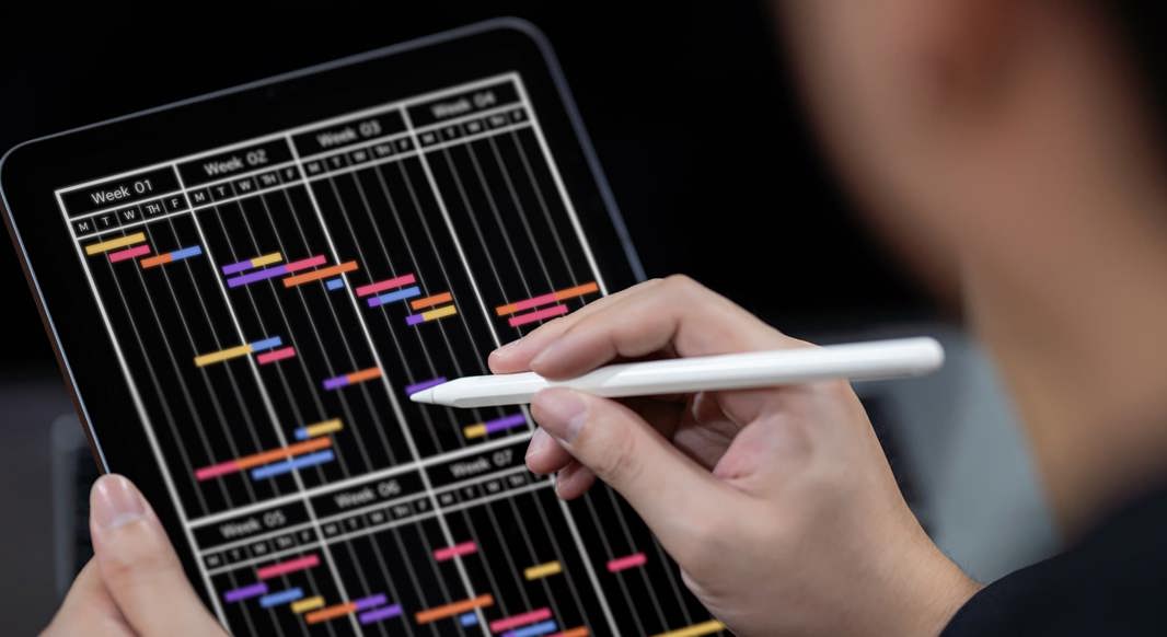 A worker looking at a project plan
